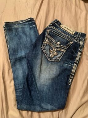 Rock Revival size 31 dark Wash  Blue Boot Cut Jeans with Embroidered Pocket